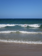 Rich body surfing on Noosa beach