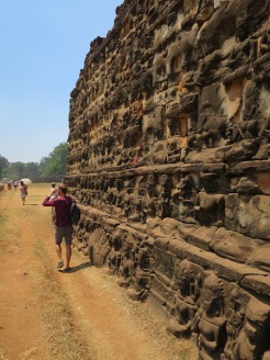 Rich showing how high the carved walls were in Angor Thom!